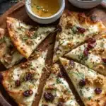 Crispy Flatbread with Brie, Cranberries & Toasted Walnuts with a Hot Honey Drizzle