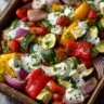 Roasted Veggie & Feta Sheet-Pan with Lemon Yogurt Sauce Recipe