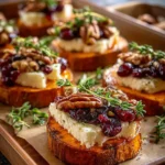 Sweet Potato Rounds with Brie, Cranberry & Pecans
