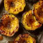 Honey-Glazed Acorn Squash with Cheddar and Apple Cider Reduction