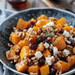 Caramelized Butternut Squash with Feta, Walnuts, and Cranberry-Honey Glaze serve