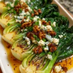 Caramelized Garlic Bok Choy with Feta, Walnuts & Hot Honey Drizzle serving
