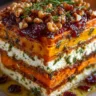 Layered Sweet Potato, Pumpkin, Carrot Lasagna with Feta, Walnuts & Cranberry-Honey Glaze