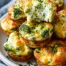 Golden Cottage Cheese Broccoli Cheddar Melt Bites with melted mozzarella cheese center and crispy cheddar crust.