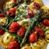 Ravioli with Cherry Tomatoes, Asparagus, Garlic, and Herbs